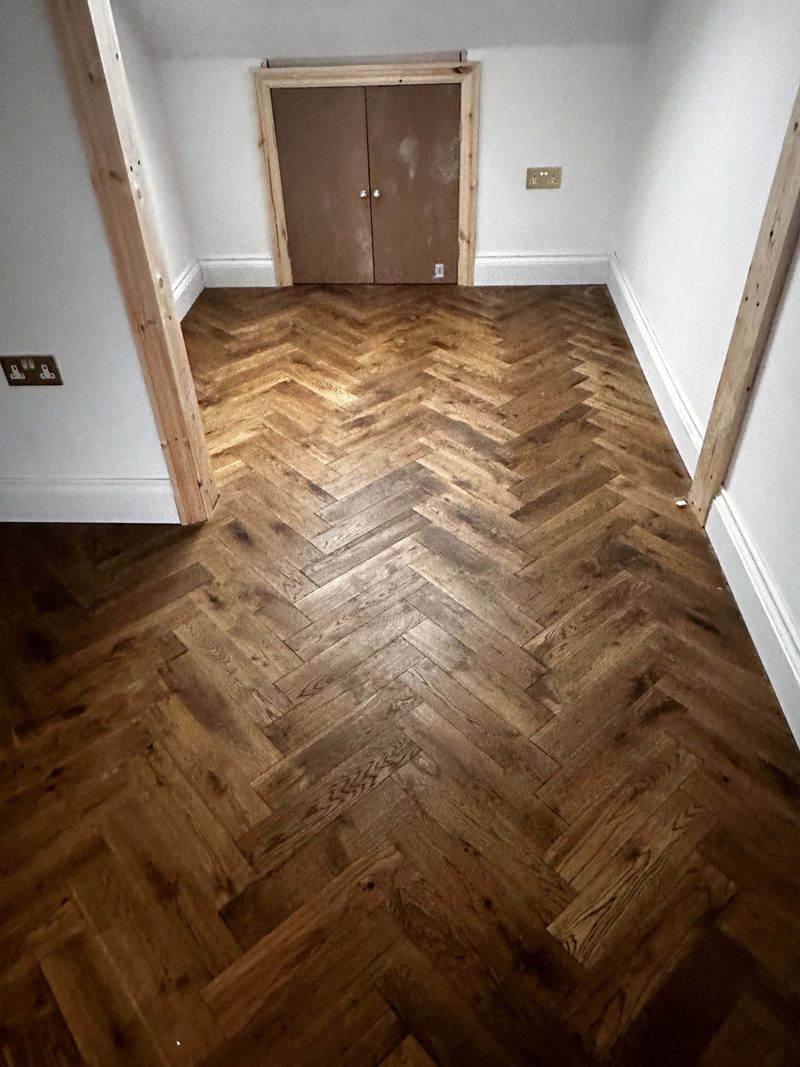 Engineered oak herringbone parquet flooring laid in a North London home